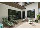 Cozy outdoor patio with comfortable lounge chairs, perfect for relaxing and enjoying the tranquil surroundings at 6905 Clayton St, Mount Dora, FL 32757