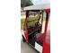 Side view of golf cart featuring a red seat and steering wheel at 8097 Se 174Th Belhaven Loop, The Villages, FL 32162