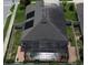 Aerial view showcases the backyard pool and lanai at 2504 Cavender Creek Rd, Minneola, FL 34715