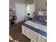 Cozy bedroom featuring natural light and neutral colors at 2504 Cavender Creek Rd, Minneola, FL 34715