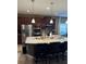 Spacious kitchen featuring a large island, stainless steel appliances, and ample counter space at 2504 Cavender Creek Rd, Minneola, FL 34715