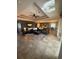 Expansive open-concept living room with recessed ceilings and tile flooring at 2504 Cavender Creek Rd, Minneola, FL 34715