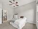 Comfortable bedroom with a closet and an en suite bathroom at 10977 Se 169Th Ln, Summerfield, FL 34491