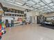 Spacious three-car garage, perfect for storage or hobbies at 10977 Se 169Th Ln, Summerfield, FL 34491