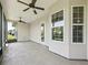 Spacious screened patio perfect for relaxing and entertaining at 10977 Se 169Th Ln, Summerfield, FL 34491