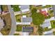 Bird's eye view of a home's layout, showcasing the roof, landscaping, and neighborhood setting at 1109 Paradise Dr, The Villages, FL 32159