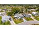 Aerial view showing lush green spaces, community living, and the location on a golf course at 1109 Paradise Dr, The Villages, FL 32159