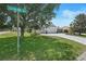 Charming home with well-manicured front lawn, mature trees, and easy access to Eureka Mill Run at 1140 Eureka Mill Run, The Villages, FL 32162