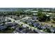 Sweeping aerial view of a residential neighborhood featuring tree-lined streets and tidy landscaping at 1268 Patterson Ter, Lake Mary, FL 32746