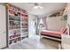 Charming bedroom featuring a bookshelf and window with plush decorations at 1268 Patterson Ter, Lake Mary, FL 32746