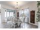 Elegant dining room with decorative lighting, creating an inviting space for gatherings and special occasions at 1268 Patterson Ter, Lake Mary, FL 32746