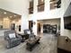Spacious living room with hardwood floors, high ceilings, and an open floor plan at 1268 Patterson Ter, Lake Mary, FL 32746