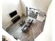 High angle showcases the open living space and back patio at 1268 Patterson Ter, Lake Mary, FL 32746