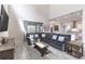 Open-concept living room showcasing a spacious layout and a seamless transition to the kitchen at 1268 Patterson Ter, Lake Mary, FL 32746