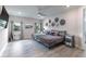 Inviting main bedroom featuring a ceiling fan, decor wall accents, and plenty of natural light at 1268 Patterson Ter, Lake Mary, FL 32746