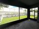 Screened patio with brick floors and a view of the landscaped backyard at 1268 Patterson Ter, Lake Mary, FL 32746