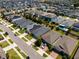 Aerial shot of the property with a red outline, showing proximity to neighborhood amenities at 13304 Magnolia Valley Dr, Clermont, FL 34711