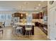 Well-lit kitchen featuring a spacious island, stainless steel appliances, and modern finishes at 13304 Magnolia Valley Dr, Clermont, FL 34711