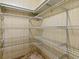 This closet features ample shelving and space for organization and storage at 1437 Apache Cir, Tavares, FL 32778