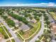 Residential neighborhood featuring well-manicured lawns, mature trees, and a peaceful atmosphere at 1473 Lakemist Ln, Clermont, FL 34711
