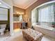 Full bathroom with a soaking tub, vanity, and a view into the water closet at 1473 Lakemist Ln, Clermont, FL 34711