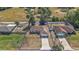 A home with a fenced yard, visible property lines, and surrounding natural landscape at 15117 Se 94Th Ter, Summerfield, FL 34491