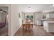 Open dining area connects kitchen and living room at 15117 Se 94Th Ter, Summerfield, FL 34491