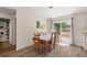 Bright dining area with a sliding glass door and views of the backyard at 15117 Se 94Th Ter, Summerfield, FL 34491