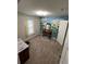 Bedroom with decorative wall art of sunflowers, a charming mirror and a ceiling fan at 1721 Nebraska Loop, Sumterville, FL 33585