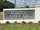 View of the Sumter Villas neighborhood entrance sign at 1721 Nebraska Loop, Sumterville, FL 33585