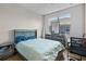 Comfortable bedroom with hardwood floors and ample natural light at 1795 Piedmont Pl, Lake Mary, FL 32746