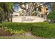 Landscaped entrance to Grande Oaks at Heathrow with mature landscaping and a monument sign at 1795 Piedmont Pl, Lake Mary, FL 32746