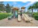 Community playground area with slides and climbing structure for hours of fun at 1795 Piedmont Pl, Lake Mary, FL 32746