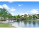Scenic pond view featuring a bridge connecting to the buildings in this community at 1795 Piedmont Pl, Lake Mary, FL 32746