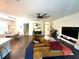 Spacious living room with a comfortable sofa, dining table and modern entertainment setup at 1893 Banning Beach Rd, Tavares, FL 32778
