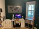 Bright office with a decorative world map hanging on the wall above a desk at 1893 Banning Beach Rd, Tavares, FL 32778