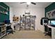 Spacious home office with natural light, ample shelving, and dedicated work areas for enhanced productivity at 1893 Banning Beach Rd, Tavares, FL 32778