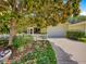 Charming single-story home featuring a well-maintained yard, lovely landscaping, and a welcoming two-car garage at 2102 Estevez Dr, Lady Lake, FL 32159
