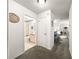 Hallway with bathroom entrance in residential home at 2102 Estevez Dr, Lady Lake, FL 32159