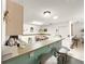 Kitchen view with bar top and barstool seating at 2102 Estevez Dr, Lady Lake, FL 32159