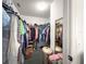Spacious walk-in closet with ample storage space for clothing and accessories at 2102 Estevez Dr, Lady Lake, FL 32159