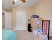 Functional bedroom features carpet, closet space, and neutral paint, providing a versatile area to customize at 2136 Fish Eagle St, Clermont, FL 34714