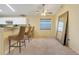 Breakfast bar with seating offers transition between kitchen and living area at 2136 Fish Eagle St, Clermont, FL 34714
