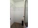 Walk-in closet with wire shelving and carpeted flooring at 222 Locust Ln, Ocala, FL 34471