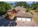 Expansive aerial view of the home showcasing the large property and beautiful lake views at 2400 N Griffin Dr, Leesburg, FL 34748