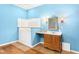 Bright bathroom featuring a walk-in tub, sink, and cabinet for the ultimate relaxing and functional space at 2400 N Griffin Dr, Leesburg, FL 34748