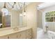 Bathroom featuring tub with shower and a decorative vanity at 2400 N Griffin Dr, Leesburg, FL 34748