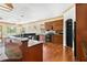 Well-equipped kitchen with granite countertops, stainless appliances, and center island sink at 2400 N Griffin Dr, Leesburg, FL 34748