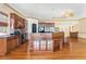 Elegant kitchen with granite counters, wooden cabinets, and modern built-in appliances at 2400 N Griffin Dr, Leesburg, FL 34748
