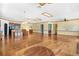 Spacious living area showcasing hardwood floors, neutral walls, and a comfortable atmosphere at 2400 N Griffin Dr, Leesburg, FL 34748